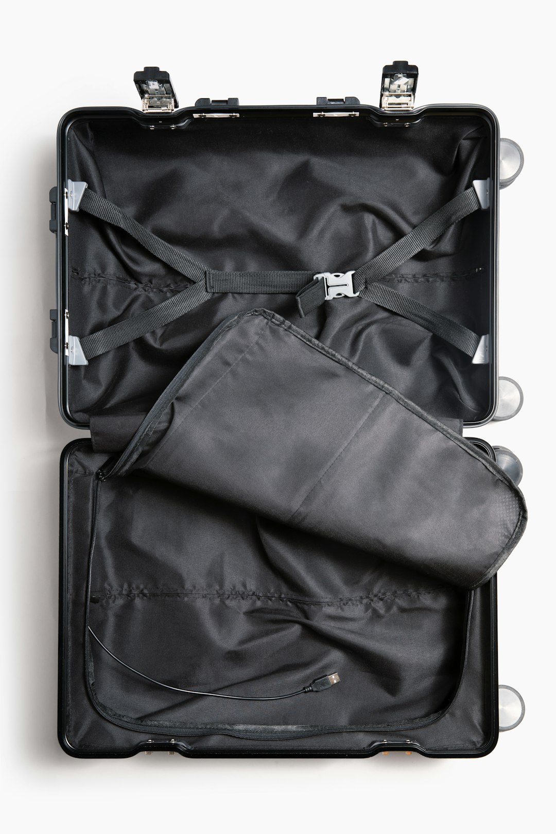 a suit case is open on a white surface